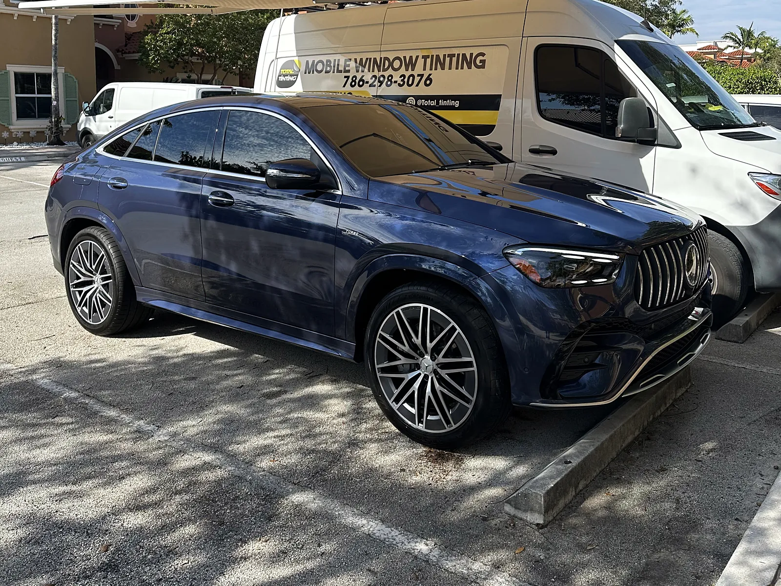 Mercedes GLE Coupé finished beside the lettered Total Tinting mobile van